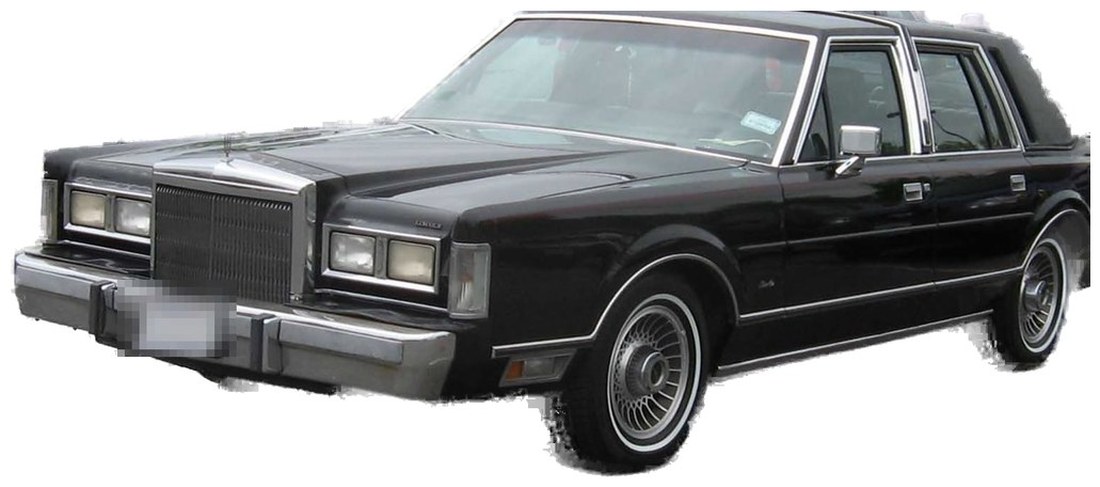 Black Lincoln Town Car sedan, the first-generation model Airport Commuter ran in its early years