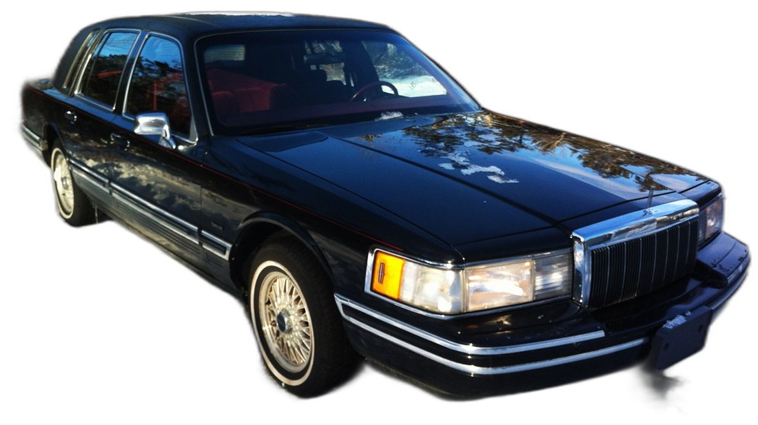Black Lincoln Town Car sedan, the second-generation aerodynamic model