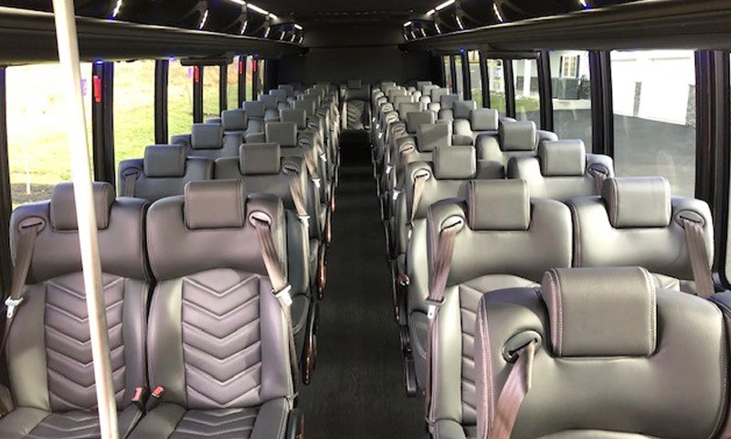 Executive Coach Shuttle Bus interior - Vanity Limousines Inc.