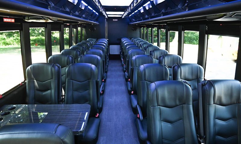 Executive Coach Shuttle Bus interior - Vanity Limousines Inc.