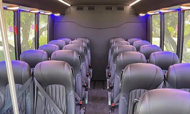 Executive Coach Shuttle Bus interior - Vanity Limousines Inc.